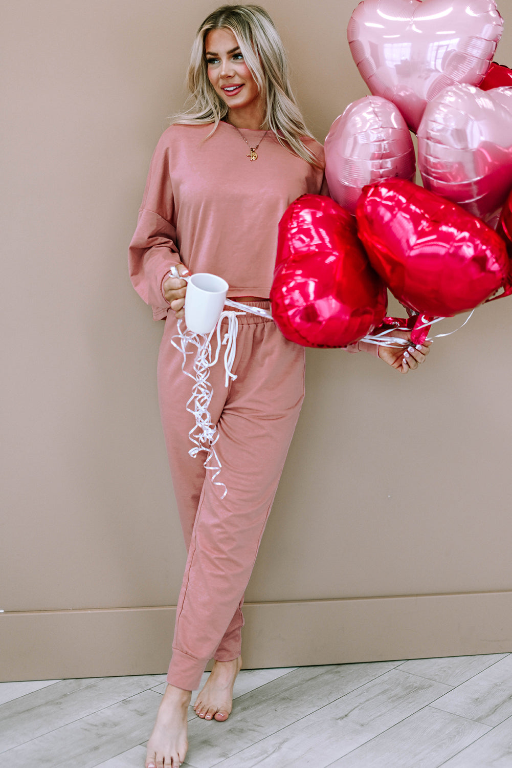 Conjunto de pulôver e calça esportivo rosa sólido boxy fit