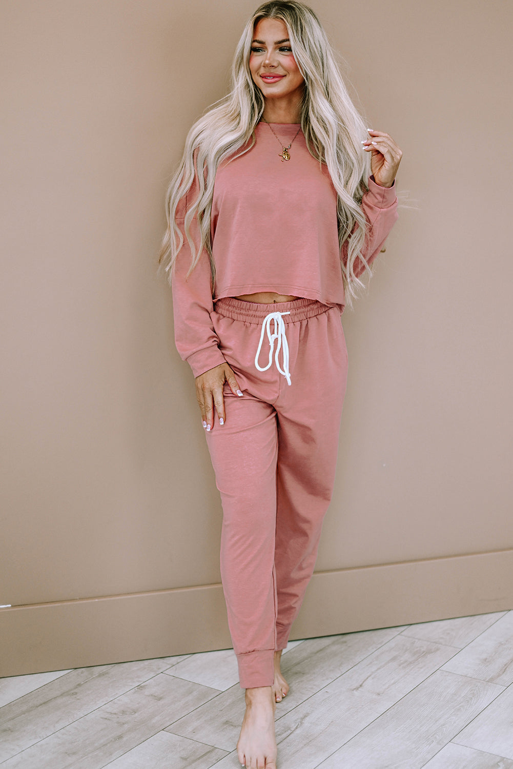 Conjunto de pulôver e calça esportivo rosa sólido boxy fit