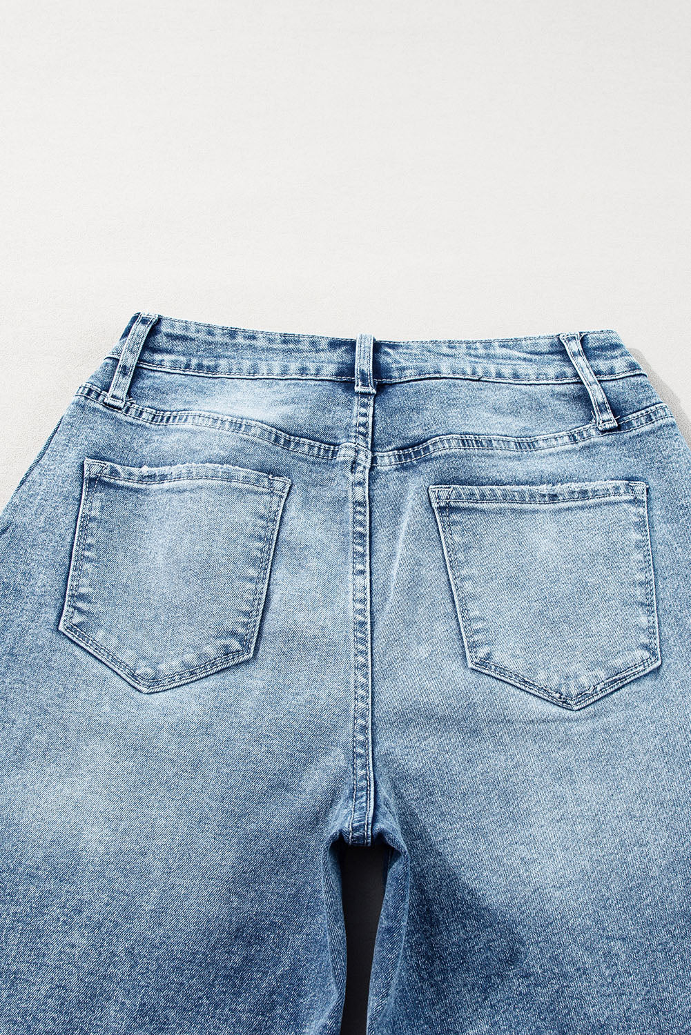 Jeans de cintura alta com costura central azul crepúsculo e perna larga