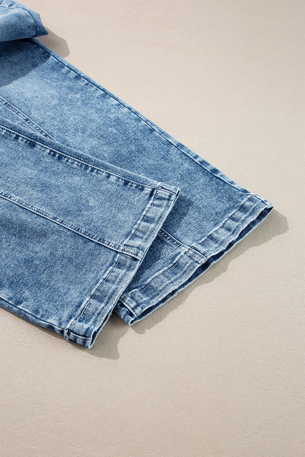 Jeans de cintura alta com costura central azul crepúsculo e perna larga