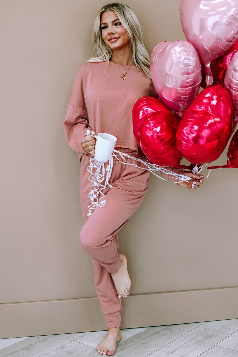 Conjunto de pulôver e calça esportivo rosa sólido boxy fit