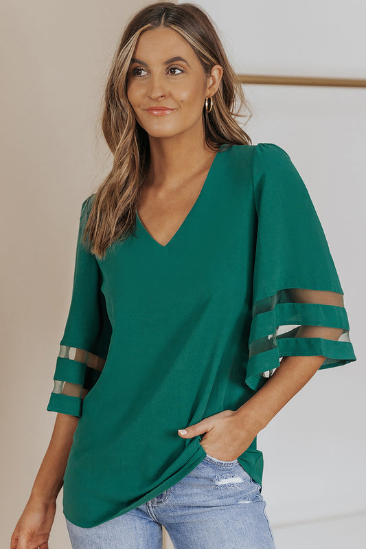 Blusa solta verde manga flare com decote em V