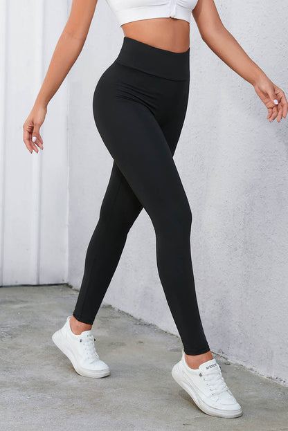 Legging taille haute noir croisé avec contrôle du ventre