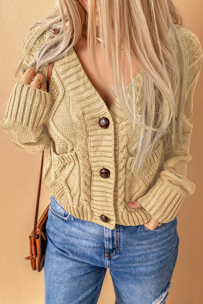 Cardigan texturé beige avec poches avant et boutons