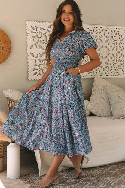 Robe longue bleue imprimée à col en V et froncée à manches courtes bouffantes