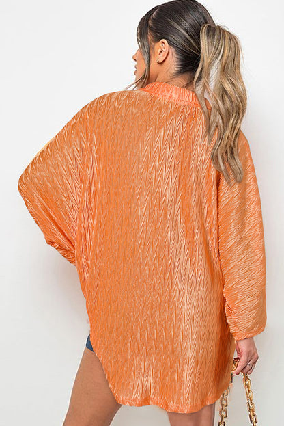 Chemise boutonnée à manches larges froissée de couleur unie orange pamplemousse