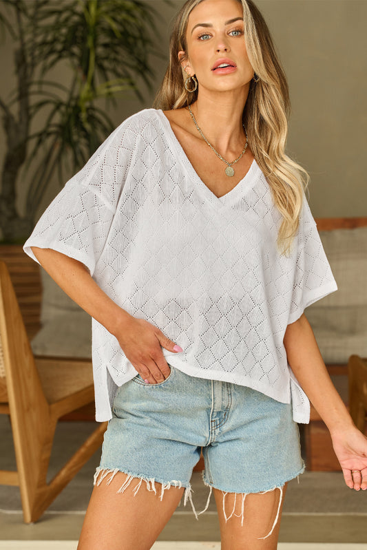 Blusa fluida de malha branca com decote em V