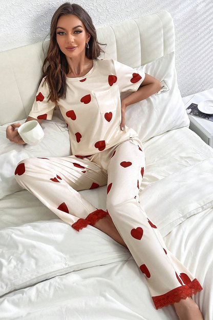 Ensemble pyjama blanc avec t-shirt et pantalon à imprimé cœur et ourlet en dentelle pour la Saint-Valentin