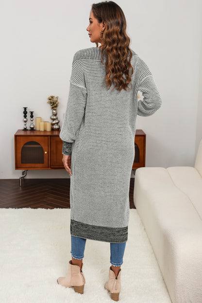 Cardigan gris à poches en tricot texturé