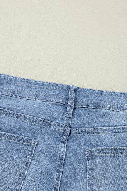 Jeans rasgados com zíper e botão assimétrico de cintura alta azul crepúsculo