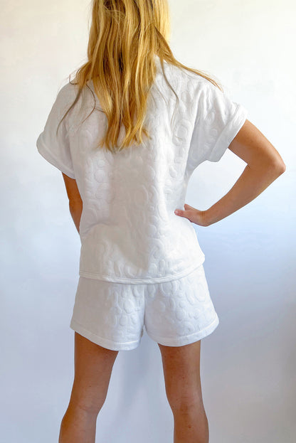 Conjunto de camiseta e shorts jacquard leopardo branco com zíper