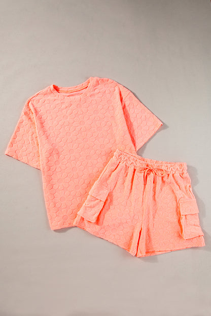 Conjunto de shorts e top de manga curta com textura floral laranja toranja