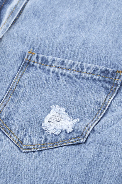 Jaqueta jeans rasgada azul desbotada