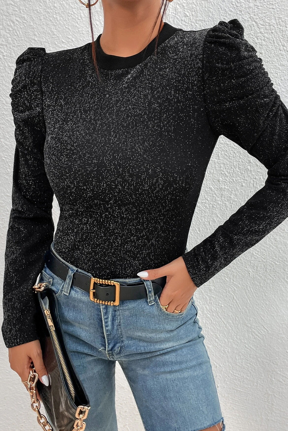 Haut slim noir en tricot métallisé à manches Gigot