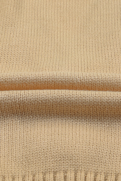 Cardigan texturé beige avec poches avant et boutons