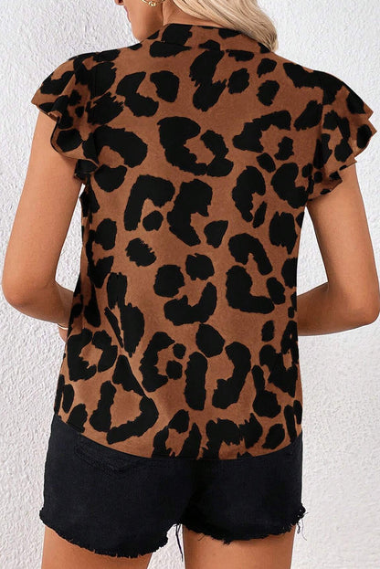 Blouse léopard noire à volants et manches flottantes à col fendu