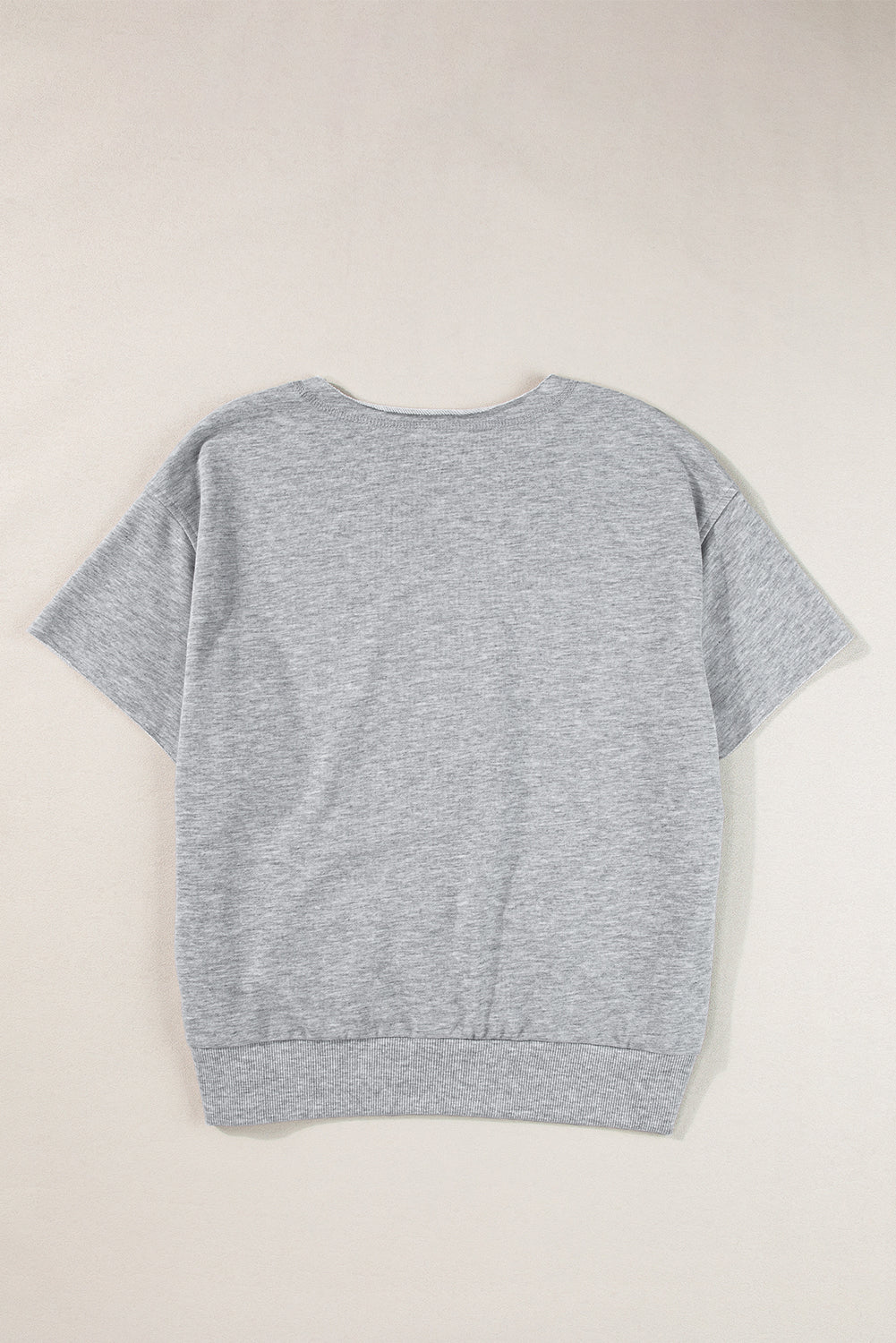 T-shirt ample gris clair avec lettrage USA et col cranté