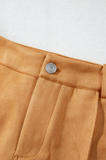 Pantalon évasé en daim marron à coutures apparentes avec poches