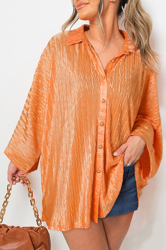 Chemise boutonnée à manches larges froissée de couleur unie orange pamplemousse