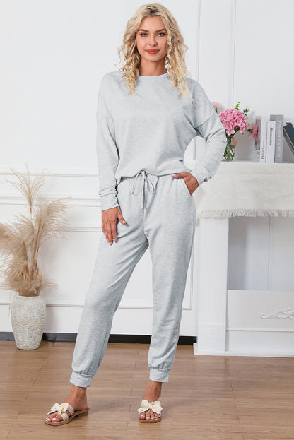 Ensemble de salon gris avec pull à manches longues et pantalon de jogging