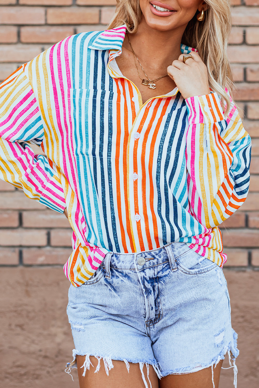 Chemise ample multicolore à rayures orange et épaules tombantes