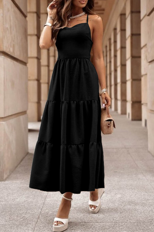 Robe longue noire croisée dos nu avec corsage à plusieurs niveaux