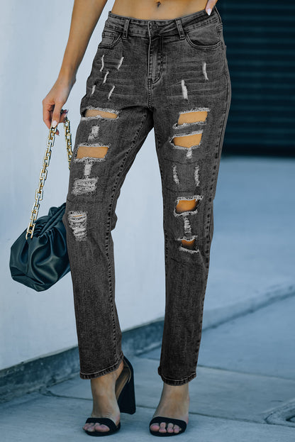 Jeans desgastados com bolsos abotoados cinza