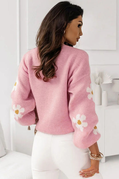 Pull rose à épaules tombantes et motif floral