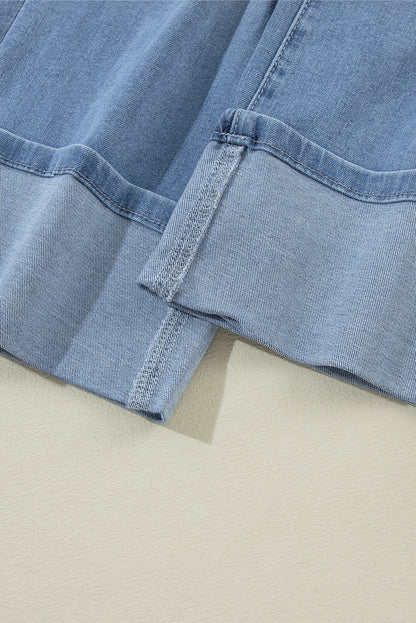 Jeans rasgados com zíper e botão assimétrico de cintura alta azul crepúsculo