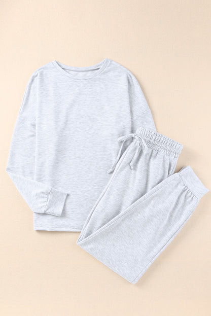 Ensemble de salon gris avec pull à manches longues et pantalon de jogging